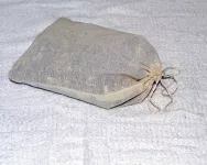 muslin bag ready to wrap dried herb mixes.