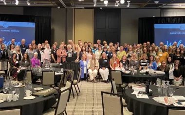 Attendees of the 2022 ABMP School Forum pose for a group picture.