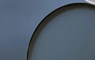 Abstract circles in clear, black, and gray colors.