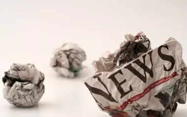 crumpled balls of newspapers. 