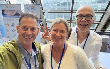 From left to right Til Luchau, Stephanie Otto, and Robert Schleip connect at the Fascia Research Congress in Montreal.