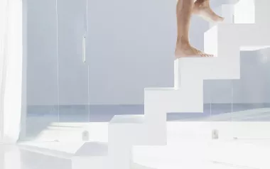 Man walking up steps. 