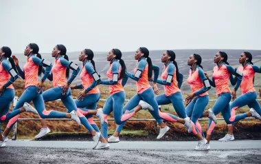 Stop-motion snapshot of a Black runner in neon colors, conveying movement.