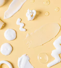 Various lotion portions poured out on display.