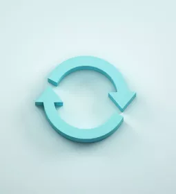 two blue arrows moving in the same direction, indicating a full circle.