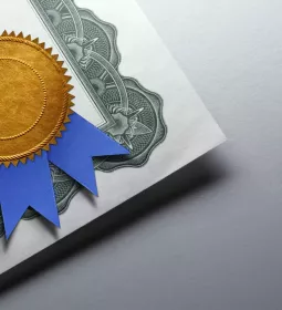 A ribbon stamp on a state certificate.