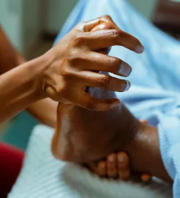 MT working on the foot of a client.