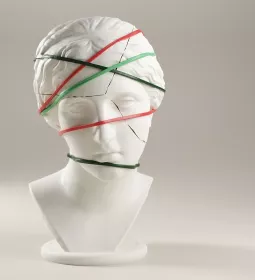 A cracked statue bust with bands around it holding it together.