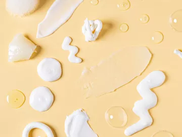 Various lotion portions poured out on display.