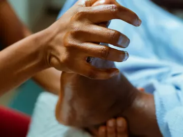 MT working on the foot of a client.