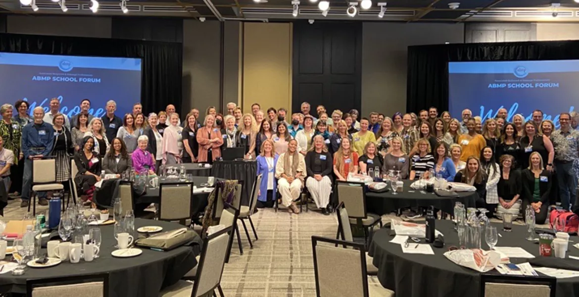 Attendees of the 2022 ABMP School Forum pose for a group picture.